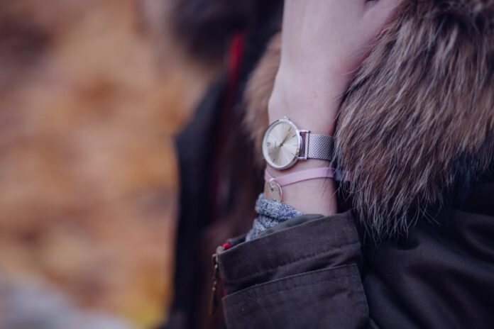 Wrist Watch wearing Woman